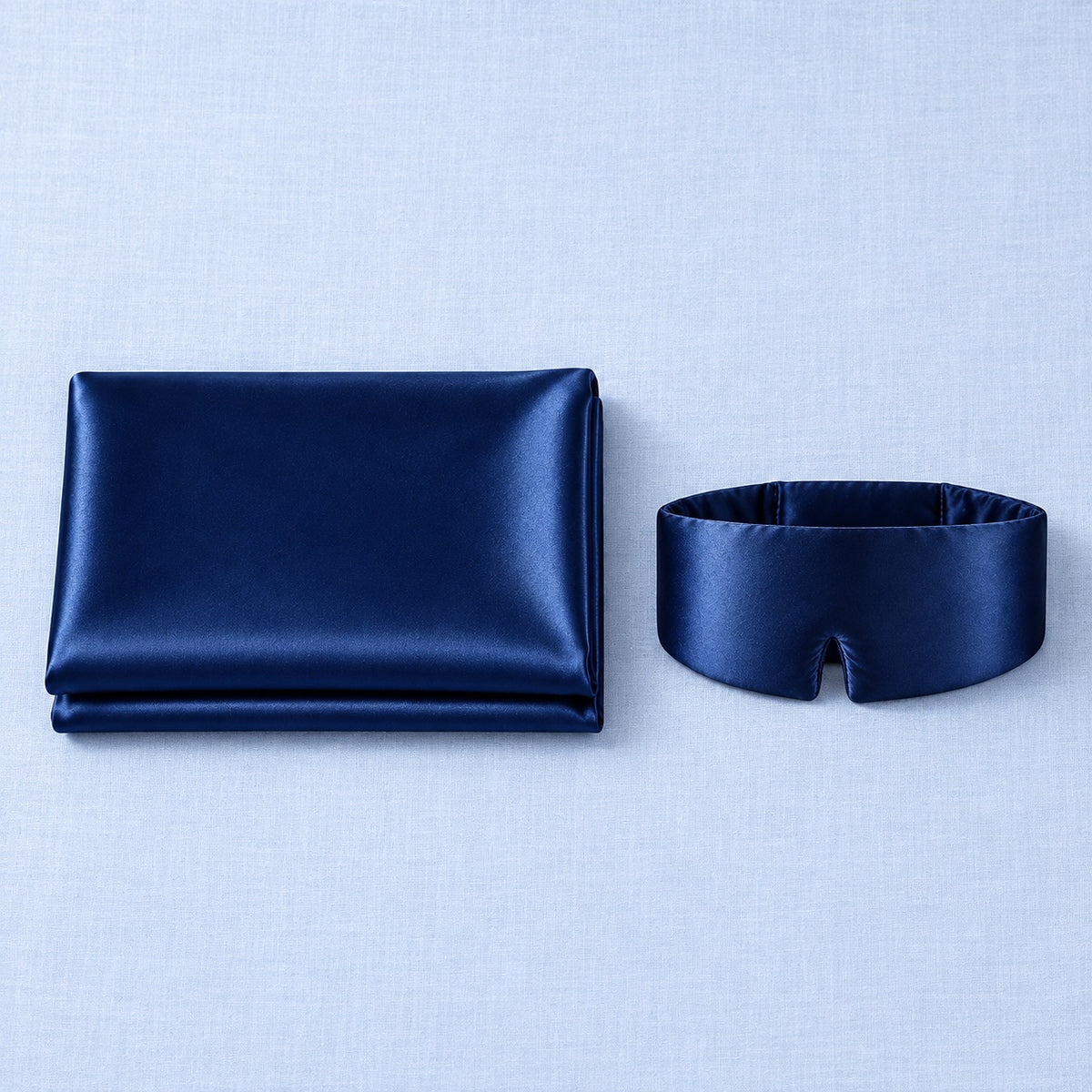 Pack duo : taie pliée et masque en soie bleu nuit à plat